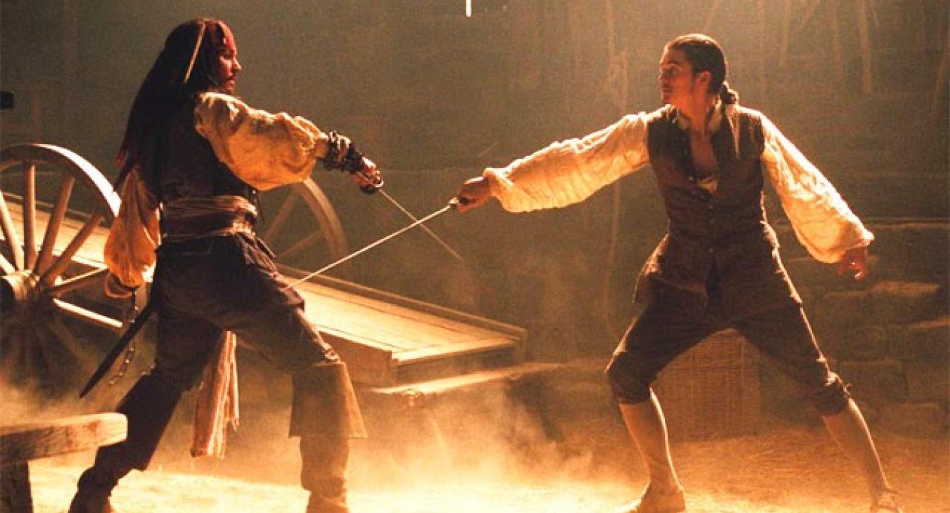 Firstly, I love this image of a fight scene in the Pirates of the Caribbean. Secondly, this image has nothing to do with The Grotto's Secret, I just love the image because it conjurs up delicious images of a great fight fight scene. The lighting helps to give the image a medieval glow.  So, to my fight scenes in my conspiracy thriller.